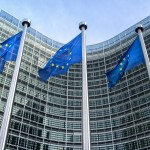 European Union flags in front of the Berlaymont building (European commission) in Brussels, Belgium.